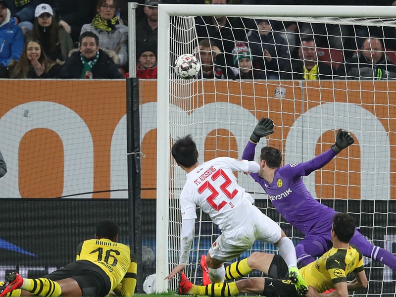 Augsburg 2 Borussia Dortmund 1: Bavarians boost neighbours Bayern in Bundesliga title race