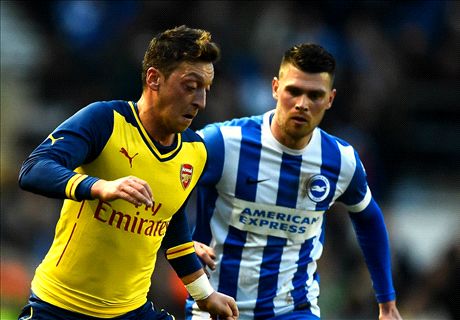 Ozil & Walcott score in thrilling win