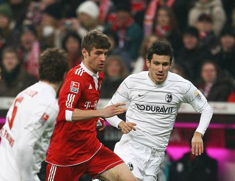 Bundesliga FC Bayern München - SC Freiburg: Mensur Mujdza & Thomas Müller (Bongarts/Getty)