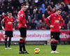 Van Persie leaves Swansea in protective boot